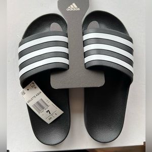 Adidas slides size 7. Brand new in box.